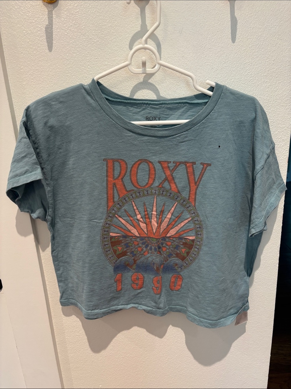 Roxy Blue Cropped Graphic Tee with Orange Accents